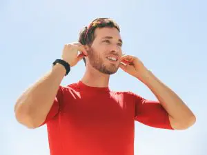 Athlete wearing hearing aids while participating in physical activity.