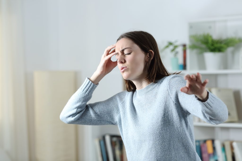 What should I do if I experience vertigo