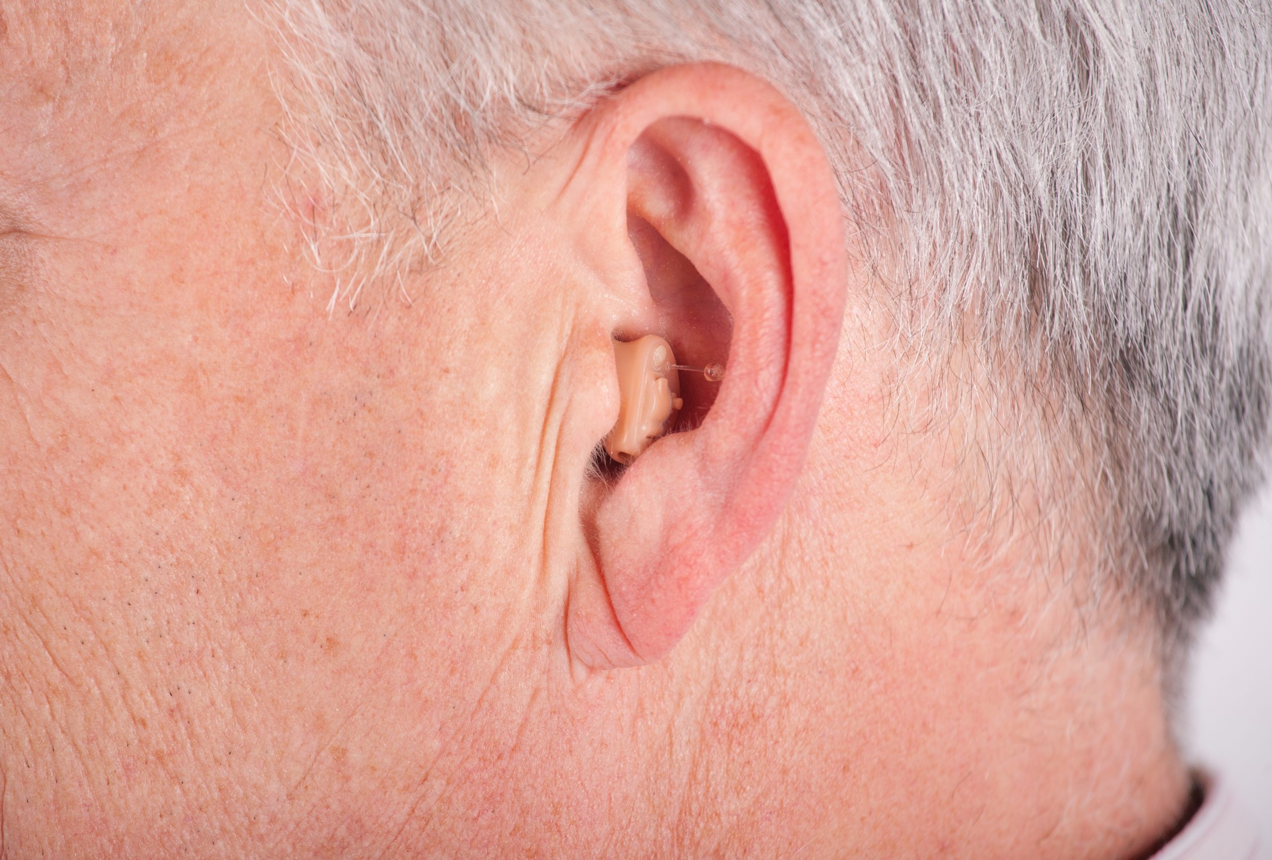 How often should custom ear molds be replaced?